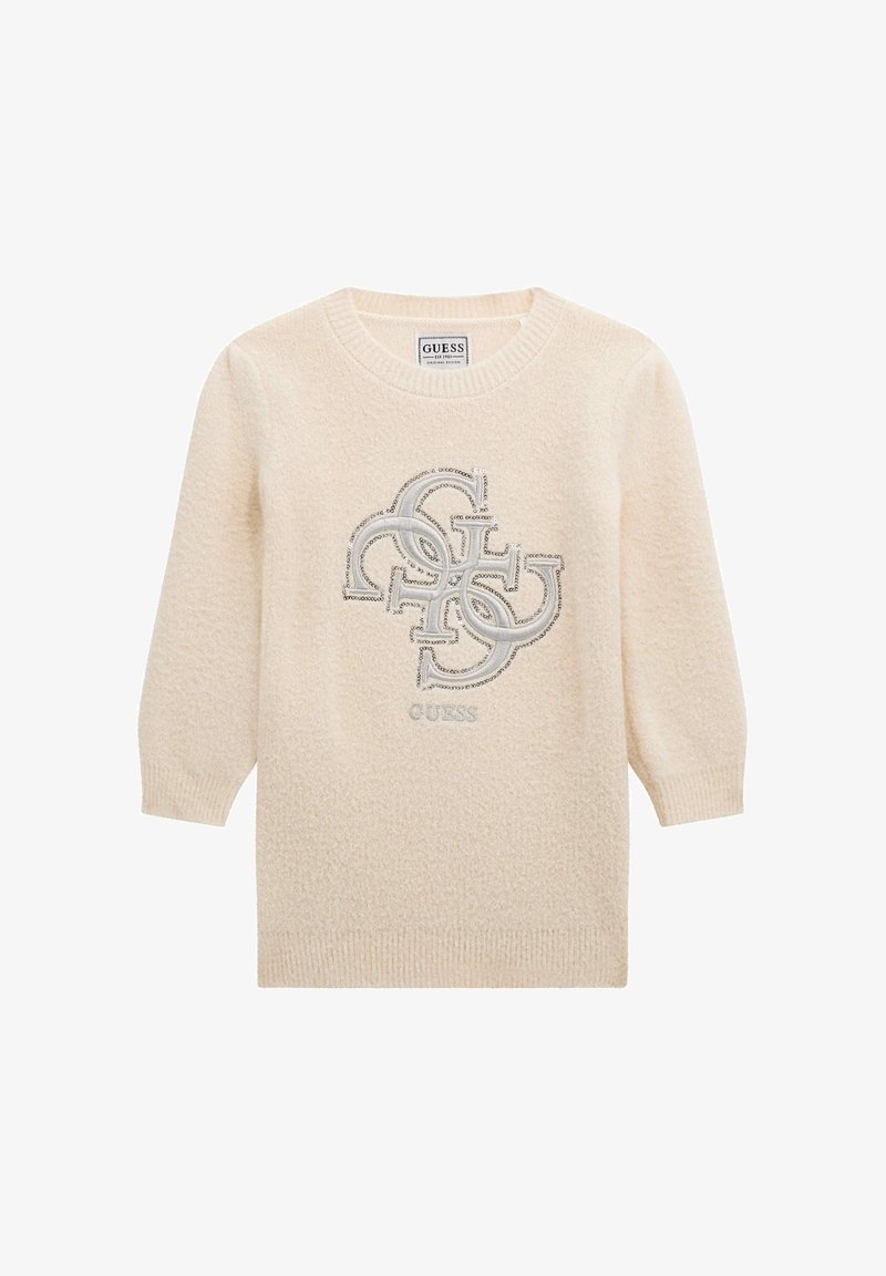 Pull à manches longues couleur crème avec poignets côtelés et logo GUESS en lettres métalliques superposées sur la poitrine.
