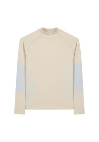 Top a maniche lunghe beige chiaro con collo alto, caratterizzato da dettagli grigi testurizzati sulle maniche e finiture a coste lungo i fianchi.