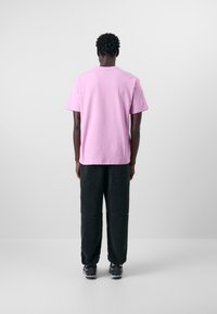 Nike ACG TEE LUNGS - Basic T-shirt - beyond pink