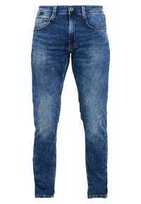 Niebieskie dżinsy z wyblakłym wykończeniem, pięcioma kieszeniami i zamkiem błyskawicznym. Materiał jest miękki, z dopasowanym krojem i lekkim streczem.