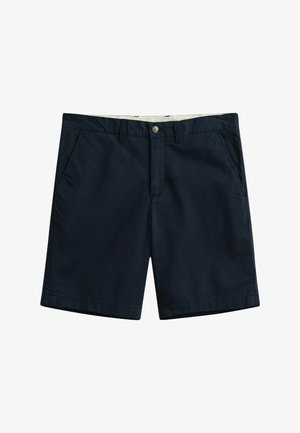Shorts pour hommes bleu marine avec bouton et fermeture éclair à l'avant, passants de ceinture, et poches latérales, présentés sur un fond blanc.