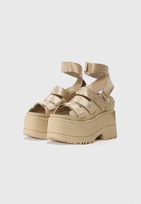 UGG GOLDENRISE - Platåsandaler - mustard seed