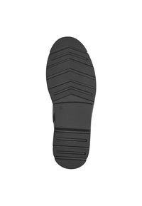 Black rubber shoe sole with zigzag traction pattern, textured surface, and marked size 37. Design emphasizes durability and grip.