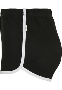 Black maternity shorts with an elastic waist, featuring a white trim along the sides. Made of soft cotton material, designed for comfort.