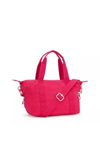 Pink canvas bag with two short handles and an adjustable shoulder strap. Features a zip closure and metal hardware accents.