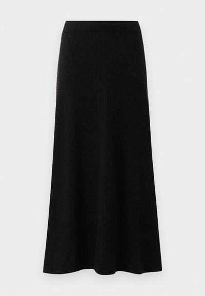 Black ribbed knit long skirt with a high waistband and subtle vertical texture, flaring gently towards the hem.