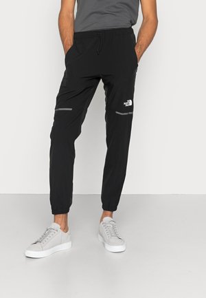 WIND PANT - Spodnie treningowe - black/black
