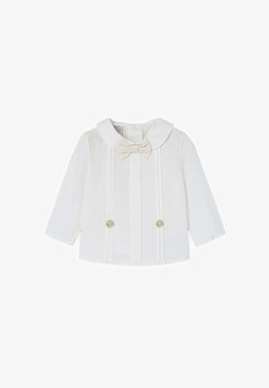 Veste blanche à manches longues avec un col rond, accent de nœud à l'avant et double boutons. Présente des plis verticaux et une texture de tissu léger.