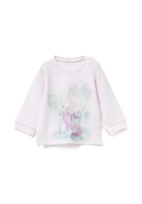 Jasnoróżowa koszulka niemowlęca z długim rękawem, z nadrukiem fioletowego kreskówkowego króliczka oraz miękkim zielonym abstrakcyjnym tłem przedstawiającym drzewa na przodzie.