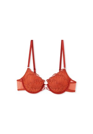 Red lace bra featuring a scalloped design, soft mesh cups, adjustable straps, and a decorative front clasp with a cut-out detail.