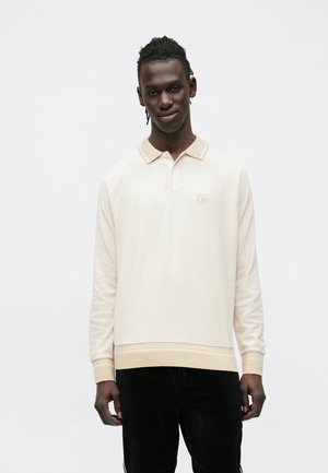 Pikkade varrukatega topp - beige