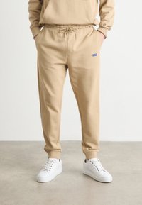HUGO NAPIN - Tréningruha alsók - medium beige