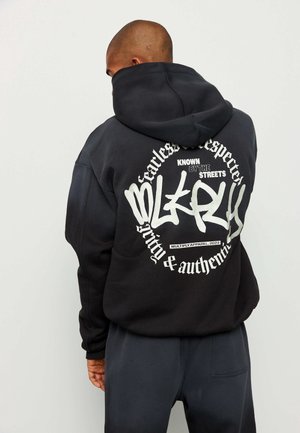 Felpa con zip - black