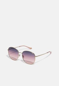 Selecionado, shiny light gold-coloured
