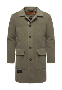 Olíva zöld gyapjú keverék kabát, galléros nyakkal, hat fekete gombbal és két zsebbel. Az alján márkajelzés található.