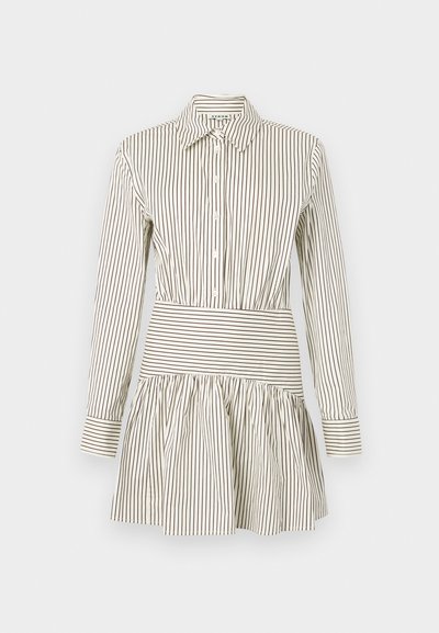 Šaty na gombíky s priliehavým pásom, rozšírenou sukňou, dlhými rukávmi a úzkymi hnedými pruhmi na krémovom pozadí. Obsahujú klasický golier.