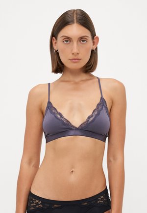 Purple lace-trimmed bralette with a soft satin finish, featuring a deep V-neck design and thin adjustable straps.