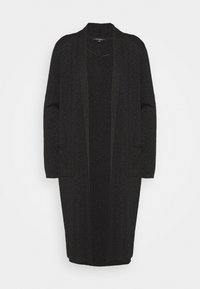 Svart cardigan i texturerat tyg med en subtil glans. Har långa ärmar, öppen front och två framfickor.