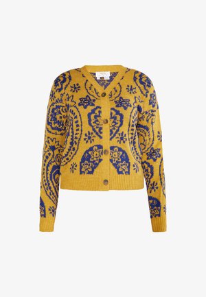Cardigan jaune avec un motif paisley bleu. Il a un col en V, des manches longues et des fermetures à bouton à l'avant avec une texture côtelée.