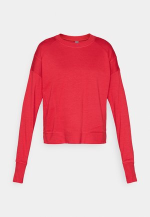 Rød langermet genser med rund hals laget av myk stoff med raglanermer, flate sømmer og en avslappet silhuett. Ingen synlig merking.