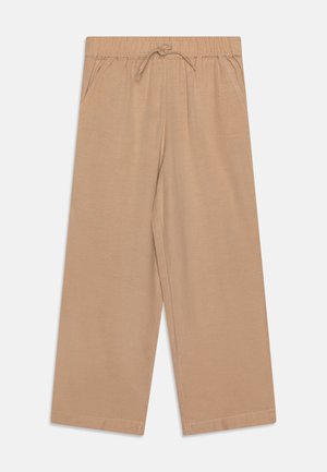 Beige, wide-leg pants with an elastic waistband and drawstring. Features two side pockets and a smooth, lightweight fabric.