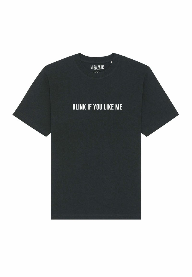 T-shirt en coton noir avec des manches courtes, un col rond et un texte blanc audacieux : "CLIGNE SI TU M'AIMES" sur la poitrine.