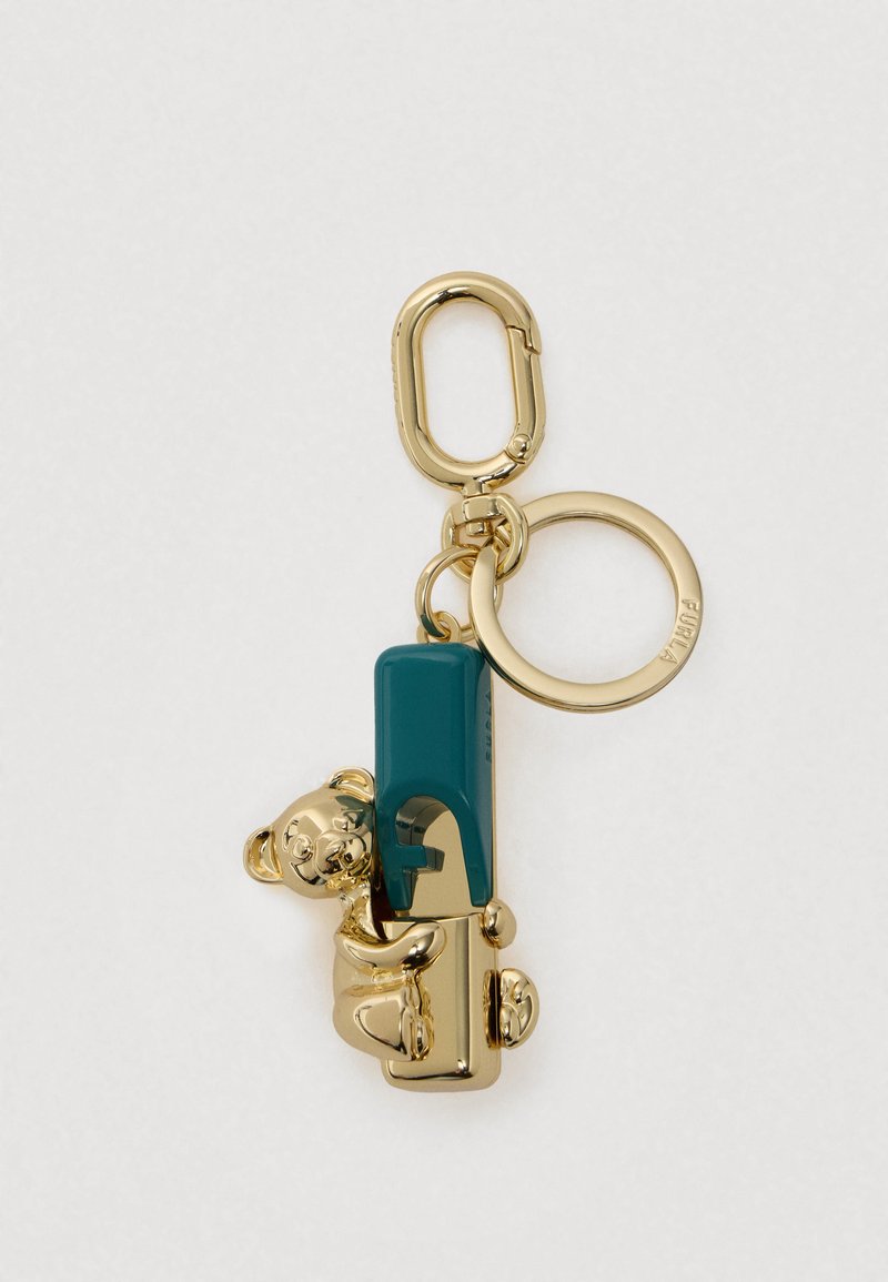 Aranyszínű kulcstartó, amely türkiz USB pendrive-ot és egy 3D-s mackót ábrázol, amely azt fogja, kör alakú gyűrűvel a rögzítéshez.