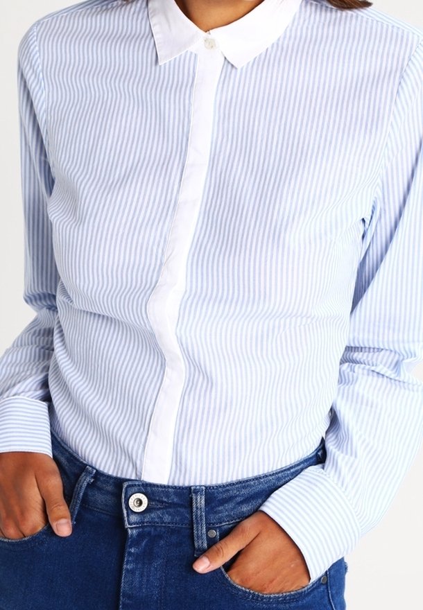 Light blue and white striped button-up shirt with a classic collar and long sleeves featuring contrasting white cuffs and button details.