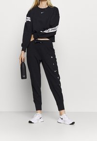 Nike Performance Trainingsbroek - black