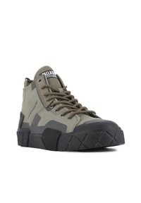 High-top sneakers in olive green canvas with black rubber sole. Features mesh upper, round toe, and contrasting laces. Textured accents on sole.
