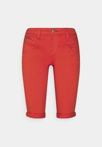 Red denim capri pants with rolled cuffs, featuring two front pockets and a zippered pocket, designed with a fitted silhouette.