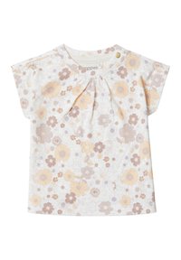 Bluse mit kurzen Ärmeln aus weichem weißen Baumwollstoff und plissiertem Ausschnitt. Besetzt mit pastellfarbenen Blumen in Gelb-, Lila- und Beigetönen.