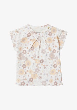 Top corto a maniche corte in morbido cotone bianco con scollatura plissettata. Presenta fiori pastello nei toni giallo, viola e beige.