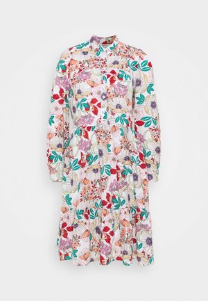 Robe à manches longues longueur genou avec imprimé floral multicolore, boutonnée devant, et jupe à volants sur fond blanc.
