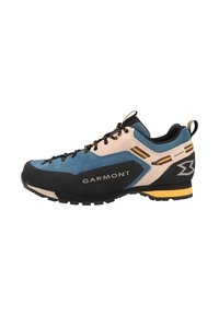 Men's Garmont hiking shoe, featuring blue and beige suede, black rubber sole, yellow accents, and a textured upper with reinforced toe cap.