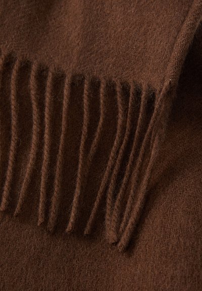 Brown wool fabric with fringed tassels along one edge, showing soft, fuzzy texture and fine knit details.