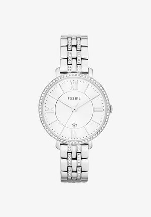 Montre-bracelet Fossil argentée avec des accents en cristal sur la lunette et le bracelet, cadran blanc, chiffres romains, trois aiguilles et guichet date à 6 heures.