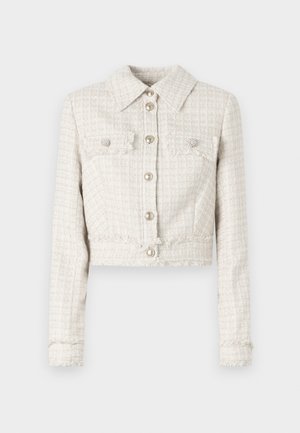 Krašto šviesiai rudos spalvos tweed švarkas su apykakle, dviem priekinėmis kišenėmis, metalinėmis sagomis ir sukimo kraštais. Tekstūruotas ir struktūrizuotas audinys.