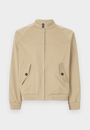 Beige Zip-Jacke mit hohem Kragen, zwei schrägen Taschen, Knopfverschluss und gerippten Bündchen, aus einem glatten, leichten Stoff gefertigt.