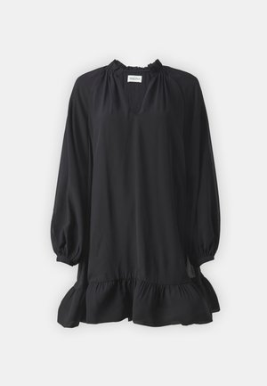 Fekete, hosszú ujjú blúz fodros nyakkivágással és hem. Lazán illeszkedő, puha anyagú, elöl V-alakú kivágással rendelkezik.