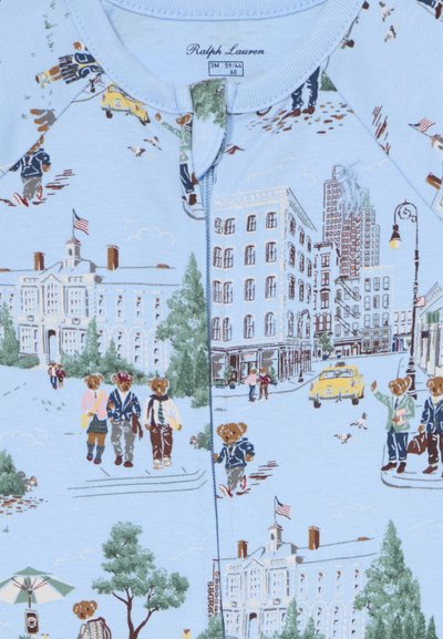 Blue fabric with Ralph Lauren label, featuring illustrated city scenes with teddy bears walking, standing, and a yellow taxi on the street.