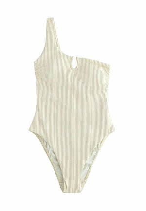 Ein beige einseitig schulterfreier, gerippter Badeanzug mit kleinem, vorderseitigem Schlüssellochausschnitt und hoch geschnittenen Beinöffnungen.