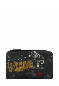 Black zippered wallet with yellow "DESIGUAL" text and white abstract sketches, featuring a small red heart symbol on the lower right side.