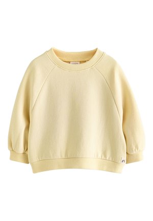 Hellgelbes Langarm-Sweatshirt für Kleinkinder mit gerippten Bündchen an Ärmeln, Saum und Halsausschnitt, mit einem kleinen Regenbogen-Label unten.