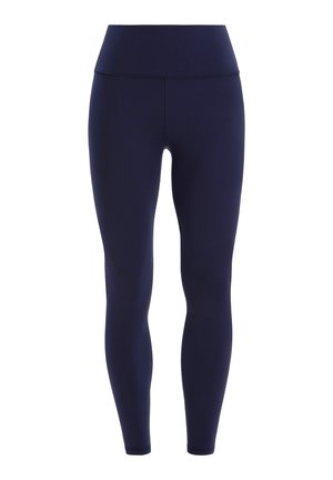 Marineblaue Leggings aus dehnbarem Stoff, mit hohem Taillenbund und glatter Textur, die für Komfort und Flexibilität entwickelt wurden.