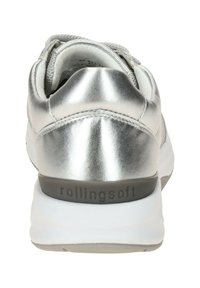 Silver synthetic sneaker with a rounded heel, textured upper, and white sole. Features "rollingsoft" branding on the heel.