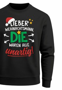 Black sweatshirt with a round neckline featuring colorful text: "Lieber Weihnachtsmann, DIE waren alle unartig!" and a Santa hat graphic above.