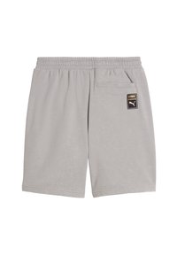 Light gray shorts with an elastic waistband, side pocket, and a back pocket featuring a black label with white text and a logo.