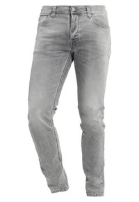 Ljusgrå denimjeans med slim fit, femfickor och knäppning. De har en urtvättad textur och diskreta sömmar.