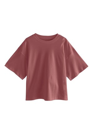 Voľný strih, tričko s krátkym rukávom a okrúhlym výstrihom v farbe prachovej ružovej, zobrazené na bielom pozadí.